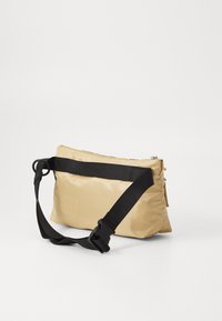 Marimekko NEAT CROSSBODY SOLID S - Skulderveske - beige