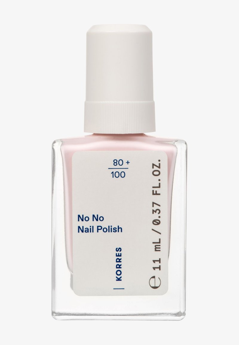 Korres No No nagellack i en klar glasflaska, har ett vitt lock, en mjuk rosa lack och en märkt framsida som framhäver produktinformation.