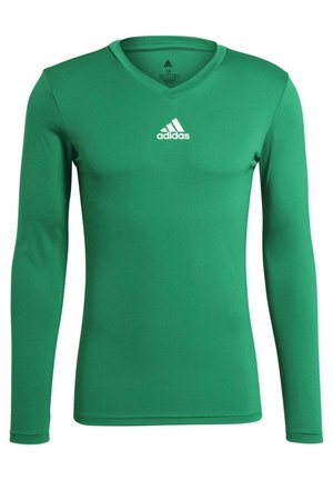 Grünes, langärmliges Sportshirt mit V-Ausschnitt, aus glattem Stoff. Mit einem weißen Adidas-Logo auf der Brust.