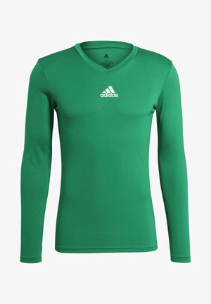 Green long-sleeve athletic shirt with a v-neck, made of smooth fabric. Features an Adidas logo in white on the chest.