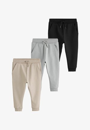 Tre par joggers med ribkant i sort, lysegrå og beige med snøre i taljen og sidelommer.