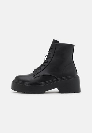 Bottines à plateau - black