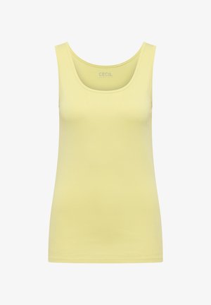Żółta bezrękawnikowa koszulka z miękkiego materiału z zaokrąglonym dekoltem i gładką fakturą. W górnej części widoczna metka marki "CECIL".