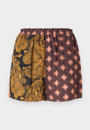 Kratke kratke hlače z elastiko v pasu. Levi del je okrašen z zlatim paisley vzorcem na črnem, desni del pa prikazuje rjavo obliko s sadnimi odtenki breskve.