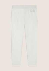 Leggings blancos con una textura suave, diseño ajustado, cintura elástica y un sutil logo "FREDDY" en plata en la parte posterior.