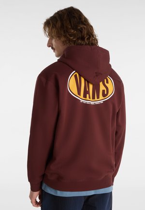 Maroon hoodie featuring a large yellow "VANS" logo on the back. Cotton material, relaxed fit, with a drawstring hood and ribbed cuffs.