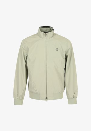 Lichtbeige bomberjack met volledige ritssluiting aan de voorkant, elastische manchetten, geribde zoom en klein zwart logo op de linkerborst.