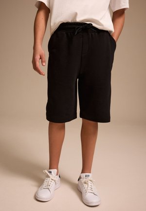 REGULAR FIT  - Donji dijelovi trenirke - black