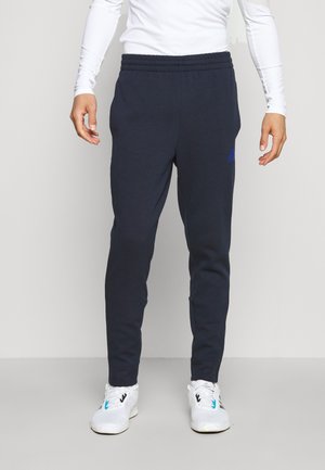 DK ESSENTIALS - Tracksuit bottoms - legend ink/bold blue