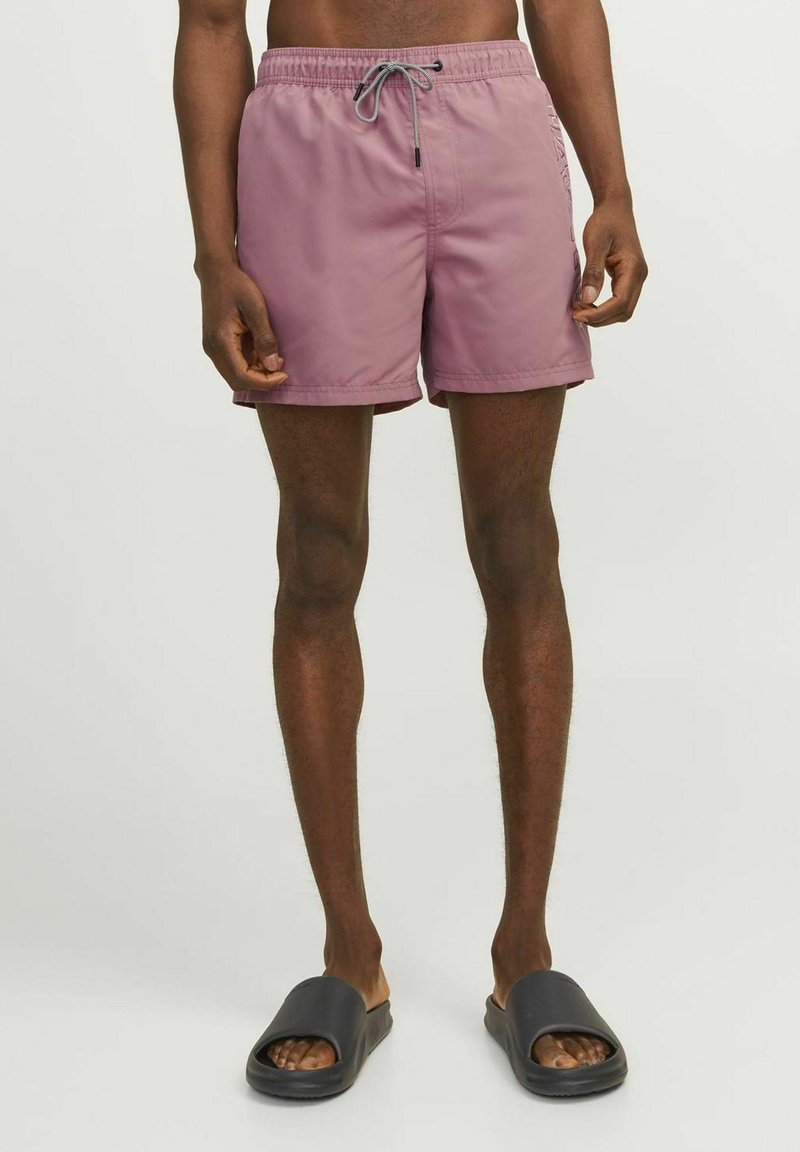 Heren zwemshorts, lichtgewicht stof, stoffige rozenkleur, elastische tailleband met koord, zijzakken, lengte boven de knie.