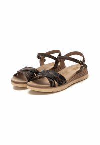 Sandali in pelle marrone con fasce incrociate, accenti in stampa leopardata, soletta ammortizzata e suola in gomma beige leggera.