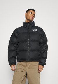 The North Face Retro Nuptse Jacket Unisex Down Jacket Black Zalando Co Uk