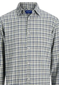 Langärmliges Hemd mit Knöpfen im beigefarbenen, marineblauen und weißen Karomuster, mit einem Kragen und einer Brusttasche auf der linken Seite.