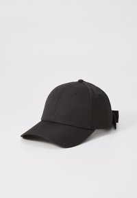 Black baseball cap with a structured shape, made of textured fabric. Features stitched detailing, a rounded visor, and a back strap closure.