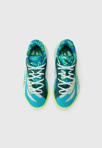 Sport shoes featuring a blue and green mesh upper with a patterned interior, contrasting white laces, and a bright yellow sole.