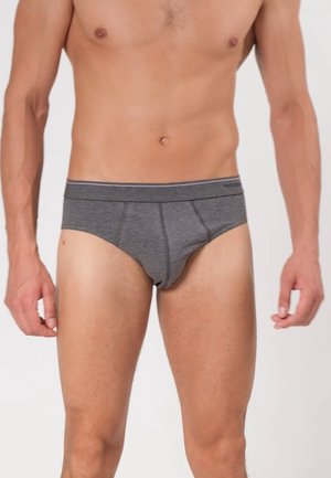 Graue Baumwollunterwäsche mit breitem, elastischem Bund. Das Design zeichnet sich durch eine glatte Textur und eine figurbetonte Form aus, die den allgemeinen Komfort betont.