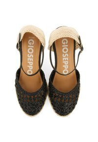Chaussures espadrilles tissées noires avec une sangle tissée beige, dotées d'un bout arrondi et d'une fermeture à boucle à la cheville. Semelle en caoutchouc.