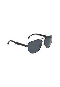Occhiali da sole aviator con lenti scure, montatura in metallo, dettagli neri e tempie ergonomiche in plastica progettate per comfort e stile.