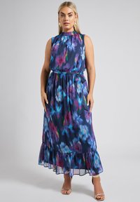 Abito lungo con motivo floreale nei toni del blu e del viola, design senza maniche, scollatura arricciata, vita elastica e orlo arricciato.