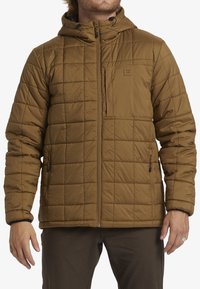 Brown quilted jacket with a zip front and hood, featuring a chest pocket and elastic cuffs. Smooth fabric with minimal hardware accents.