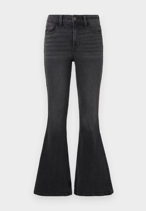 Black flared jeans in denim with a solid color, featuring a standard waistband, five pockets, and subtle stitching details on front.