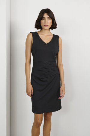 Black sleeveless dress with a V-neck, ruched side details, and fitted shape, made from smooth fabric, featuring a knee-length hem.