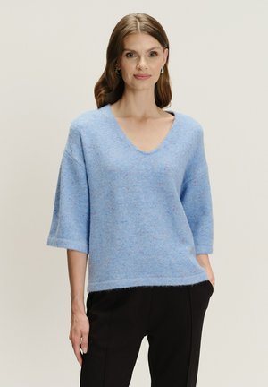 - Sweter