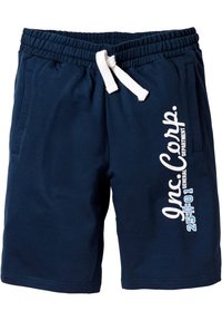 Pantaloncini di cotone blu navy con cintura elastica e lacci bianchi. Presentano tasche laterali e testo stampato in bianco sulla gamba sinistra.