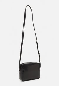 Calvin Klein RE-LOCK CAMERA BAG - Bandolera - black