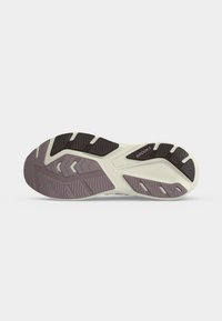 Shoe sole with black and gray treads and the Brooks logo, showing slip-resistant textured patterns for grip and durability.