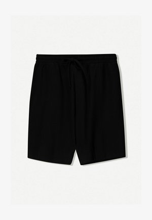 Pantaloni corti neri realizzati in tessuto leggero, con vita elastica e cordoncino, pieghe frontali e lunghezza sopra il ginocchio.