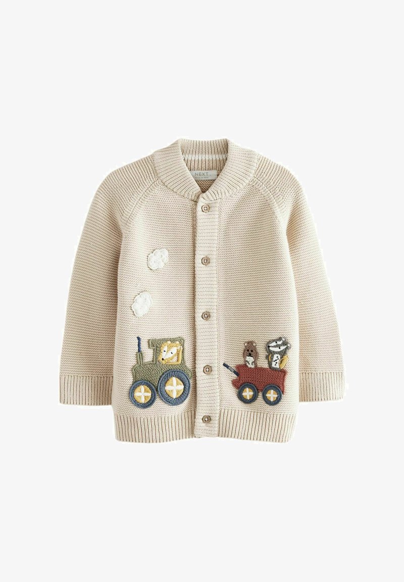 Cream-colored knitted cardigan with a shawl collar, wooden buttons, and embroidered tractor and animal patches on the front.