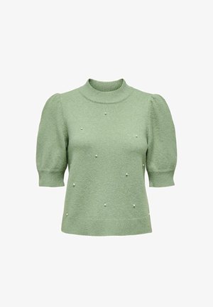 Grønn strikket genser med korte pufferm, høy hals og teksturert overflate. Pyntet med små, jevnt fordelte perleaksenter.
