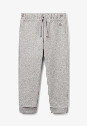 Pantalon de survêtement gris clair avec ceinture élastique, cordon, poignets côtelés et petit logo brodé sur la hanche droite.