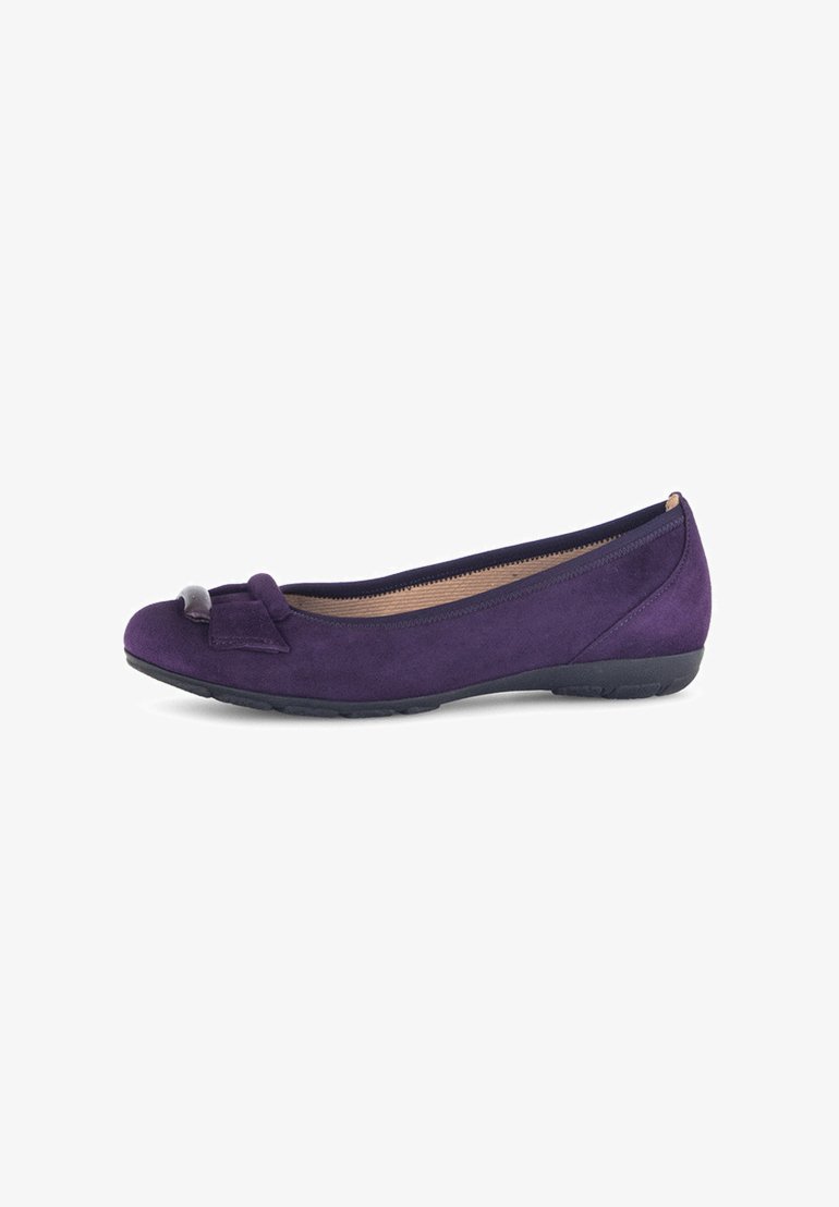 Purple suede ballet flats with a structured toe, featuring a bow accent and a low black rubber sole for comfort. Smooth inner lining.