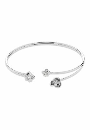 Offenes Silberarmband mit blumen- und schleifenförmigen Enden, jeweils mit einem kleinen klaren Edelstein besetzt.