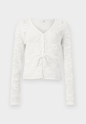 Cardigan en crochet blanc à manches longues, col en V, boutons à l'avant et détail noué à la taille.