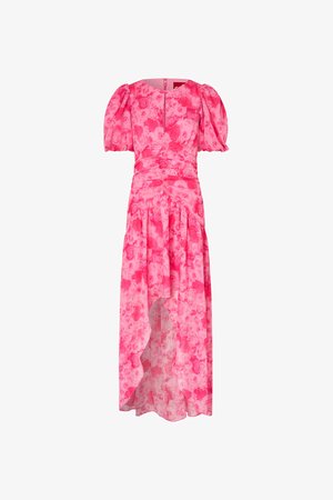 Ροζ φλοράλ φόρεμα με υψηλή-χαμηλή γραμμή, φουσκωτά κοντά μανίκια, ζωνάκι στη μέση, στρογγυλή λαιμόκοψη και ασύμμετρο τελείωμα.