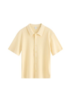 SHORT-SLEEVED WITH WAFFLED STRUCTURE - Vapaa-ajan kauluspaita - light yellow