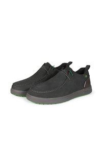 Scarpe in suede nere con punta arrotondata, cuciture a contrasto, dettagli verdi e suola in gomma con piccoli motivi antiscivolo.