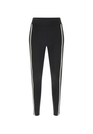 Leggings aderenti neri con fascia alta in vita e strisce verticali bianche che corrono lungo i lati esterni di entrambe le gambe.