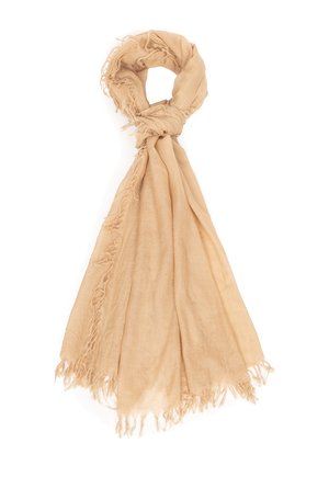 Jasnobeżowy szalik o miękkiej fakturze, luźno zawiązany na górze, z postrzępionymi brzegami i zwisającymi fałdami tkaniny.