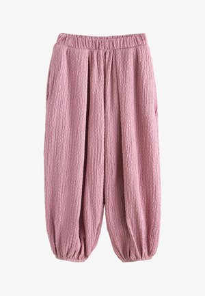 Roze gestructureerde, wijd uitlopende broek met elastische tailleband en elastische boorden, losse pasvorm en zachte stof.
