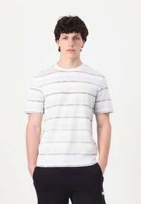 Short-sleeve t-shirt in light gray with horizontal dark gray stripes, round neckline, smooth texture, and relaxed fit.