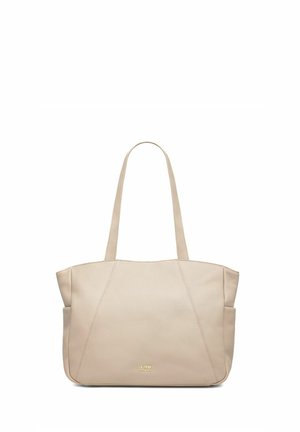 Beżowa skórzana torba typu tote z długimi uchwytami, bocznymi kieszeniami oraz złotym logo "CÉCHNIK" umieszczonym centralnie blisko dołu.