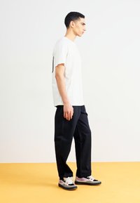 Converse STRAIGHT LEG PANTS - Calças - black