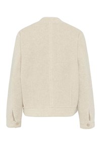 Helle beige Jacke aus strukturiertem Stoff. Verfügt über einen hohen Kragen, lange Ärmel und Knopfdetails an den Ärmeln sowie einen geraden Schnitt.