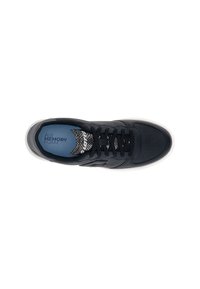 Black athletic shoe with textured synthetic upper, lace design, and a blue insock labeled "Air Memory Foam." White rubber outsole.