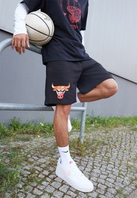 New Era Krótkie spodenki sportowe