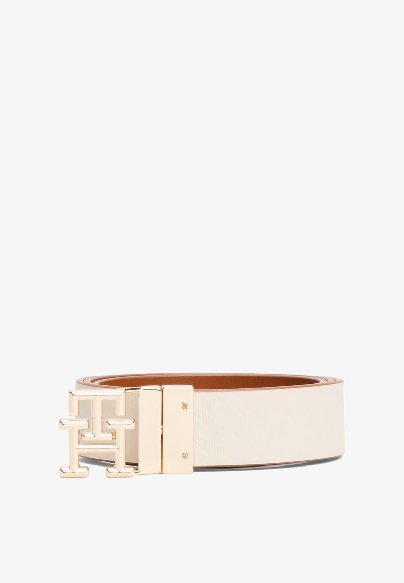 White leather belt featuring a gold-tone metal buckle with the logo design. Textured finish on the belt and smooth inner lining.